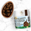 Charger l'image dans la galerie, Oeuf surprise au chocolat au lait végétal garni de cocos pralinés et de caramel salé (100g)
