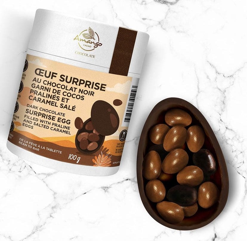 Œuf surprise au chocolat noir garni de cocos pralinés et caramel salé (100g)